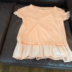 A peach /orangey type shirt!!